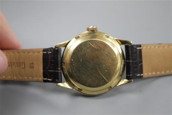 A gentlemans early 1950s 750 yellow metal Omega automatic wrist watch. movement c.354